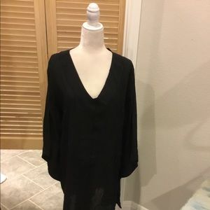 Stylish Black swimsuit cover up.